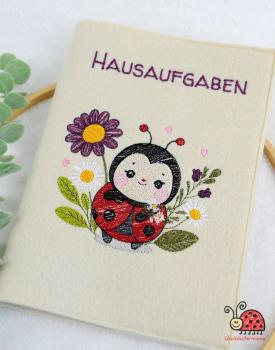 Huelle fuers Hausaufgabenheft Glueck Marienkaefer