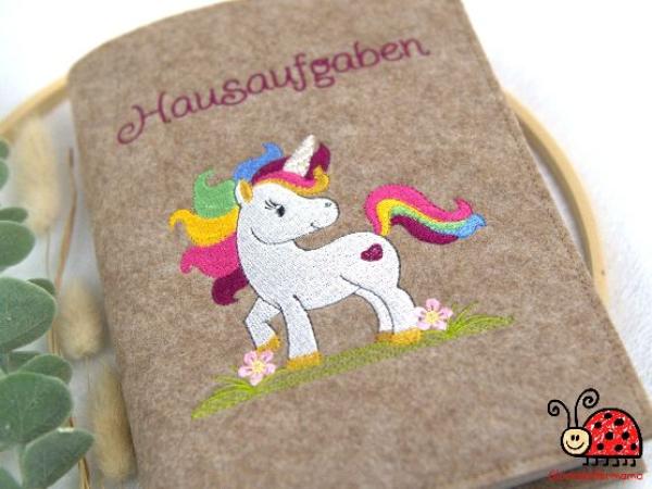 Hausaufgabenheft Huelle Wollfilz farbenfroh Einhorn