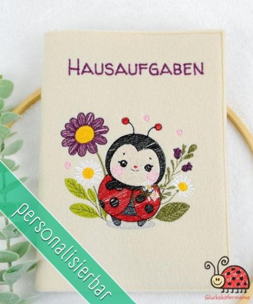 Huelle fuers Hausaufgabenheft Marienkaefer